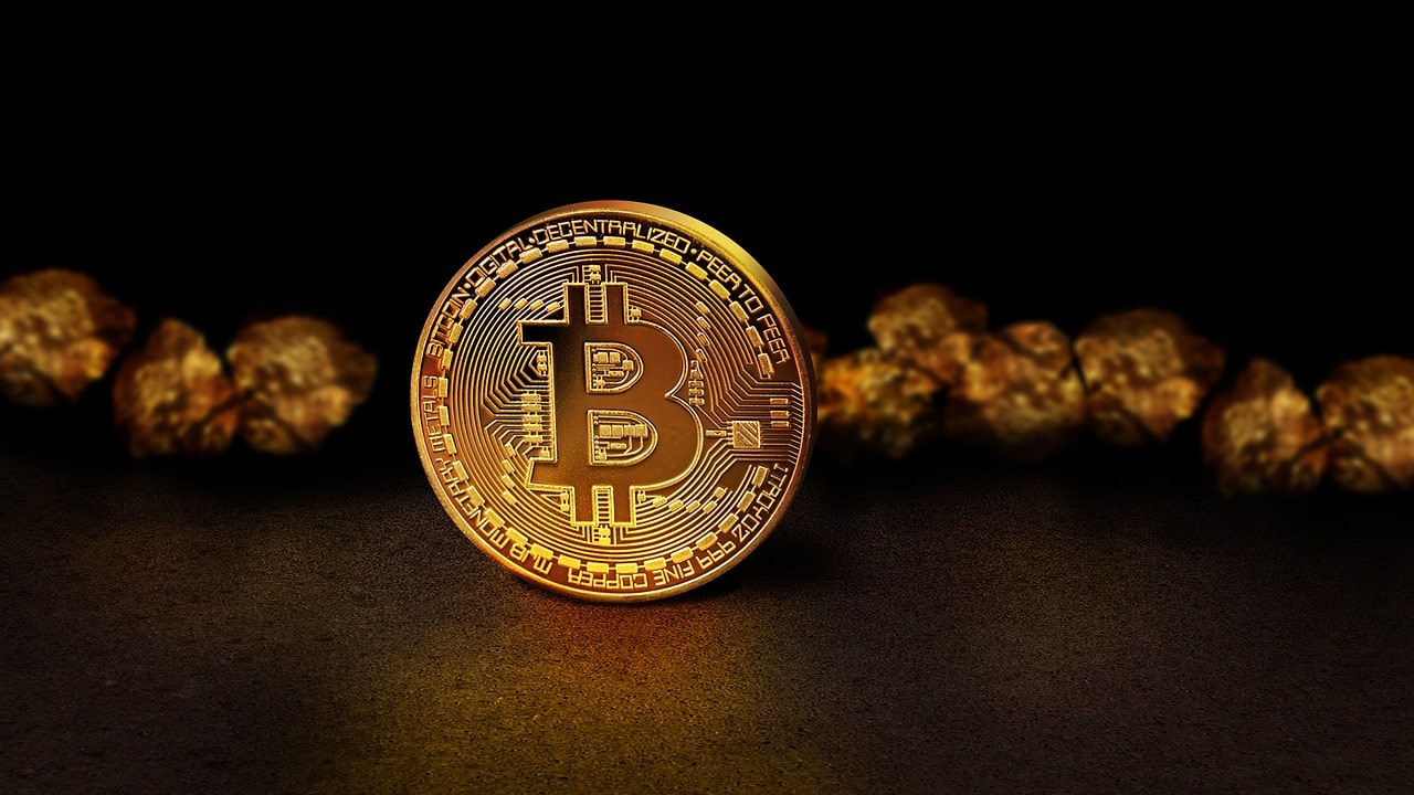 Em uma crise financeira, comprar ouro e/ou Bitcoin?