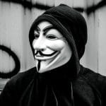 Pessoa com máscara do Anonymous