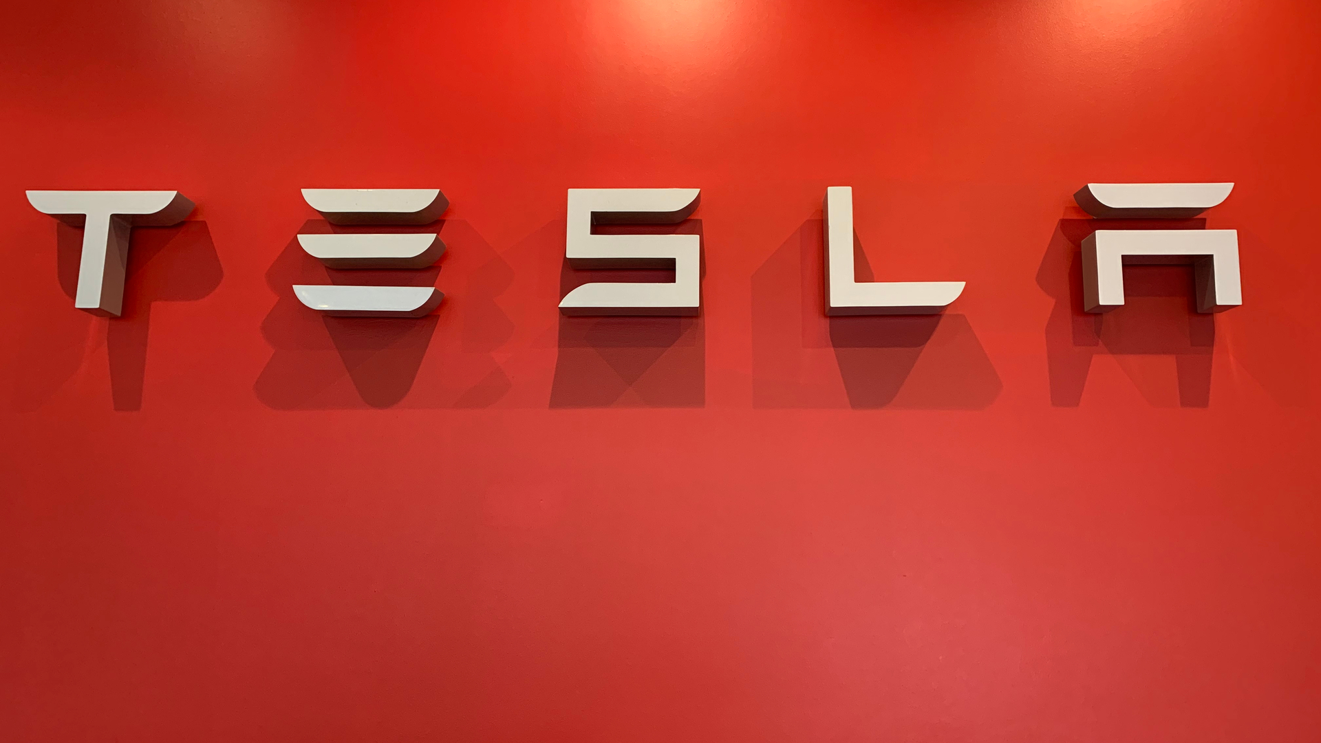 Símbolo da Tesla Bitcoin