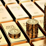 Pilhas de Bitcoin e barras de ouro