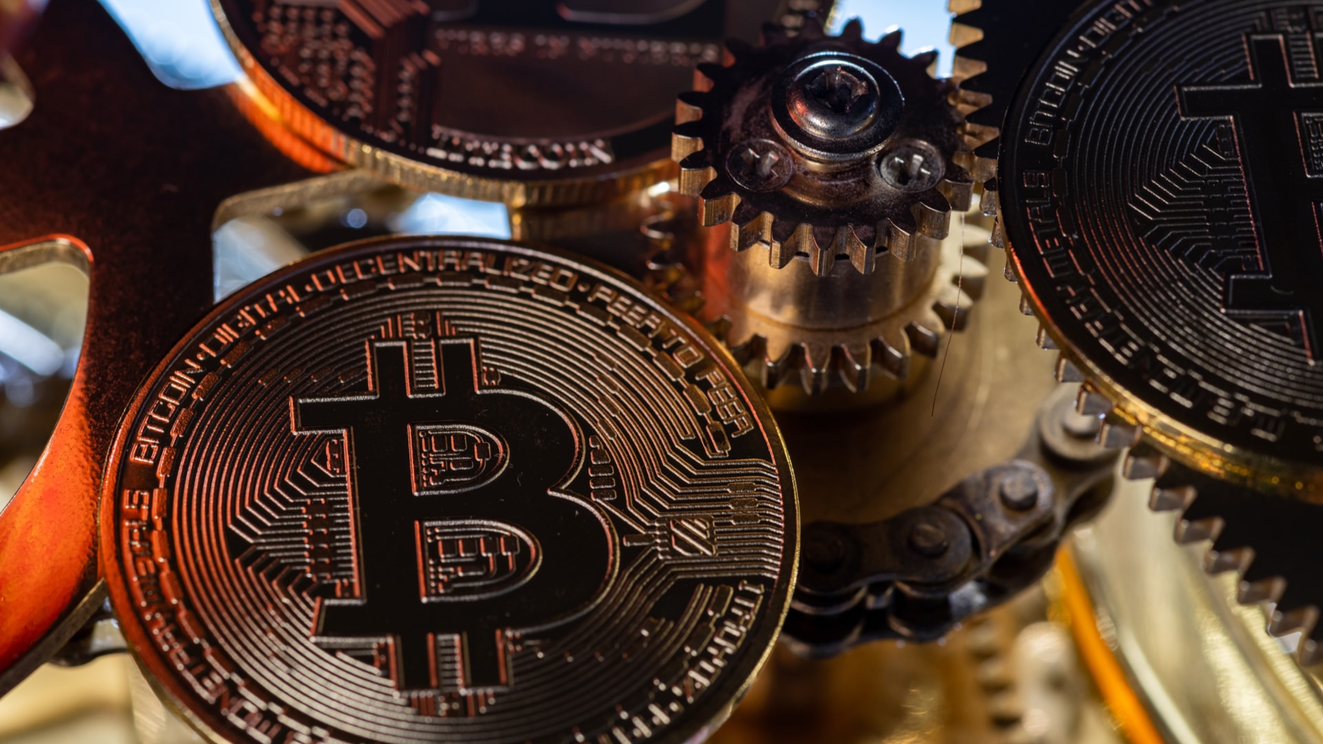Moeda de bitcoin e engrenagens