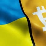 Bandeira da Ucrânia e logotipo do Bitcoin.