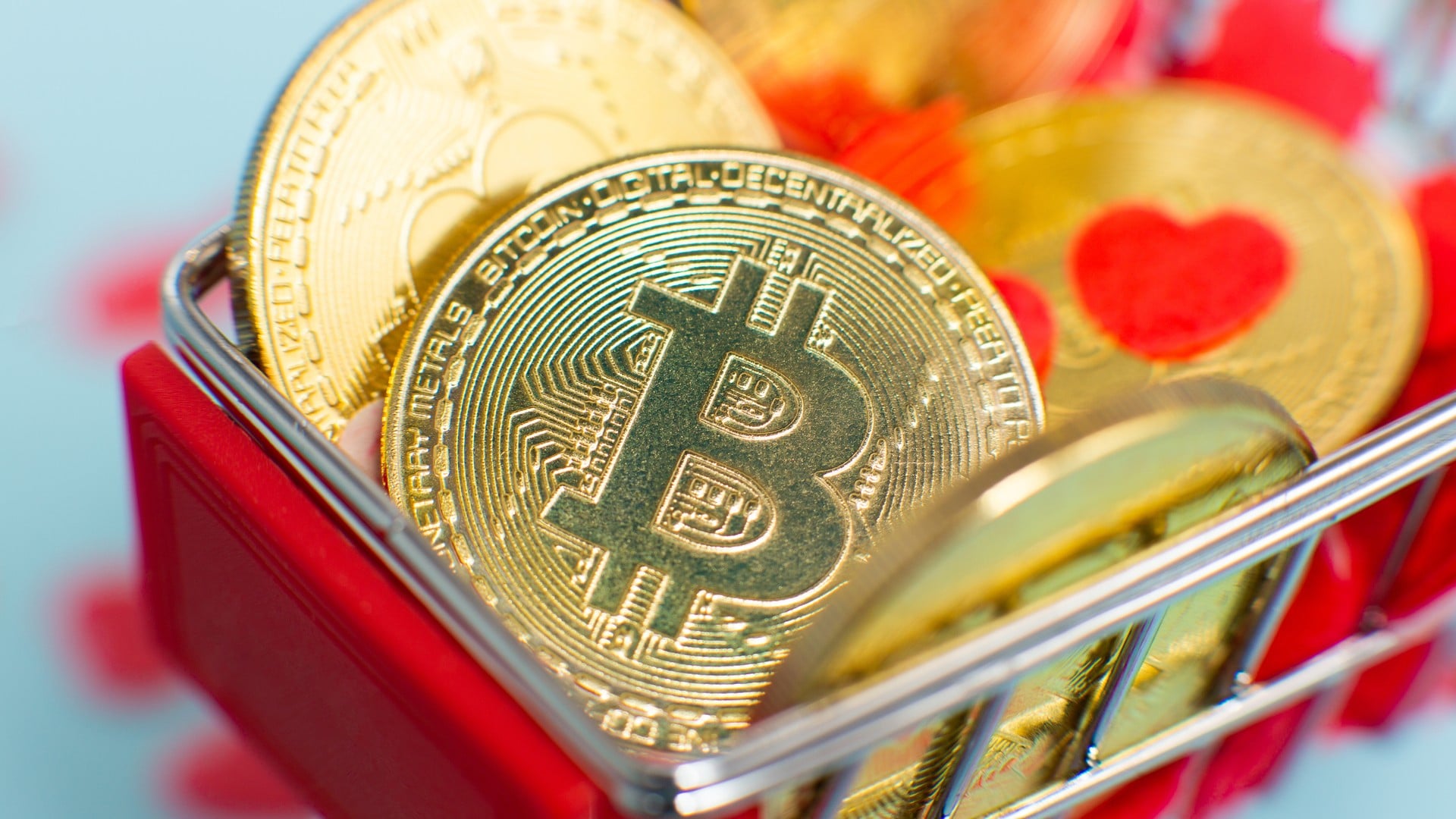 Bitcoin em carrinho de compra com imagem de coração, romance