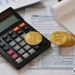 Calculadora e criptomoedas, em tributação e Receita Federal