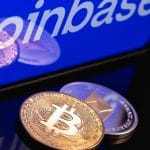 Criptomoedas Bitcoin e Ethereum próximo de símbolo da Coinbase