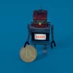 Robô próximo de bitcoin com placa de scam