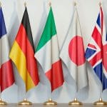 Bandeiras dos países do G7: Canadá, França, Alemanha, Itália, Japão, Reino Unido e EUA.