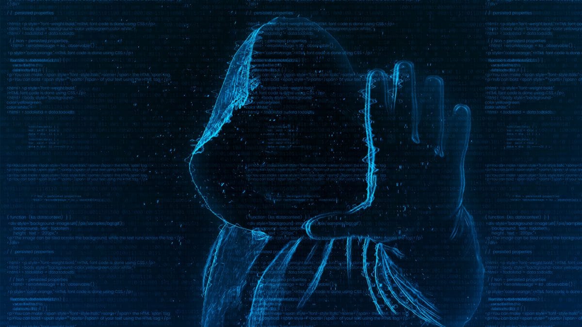 Silhueta de hacker criada com código.