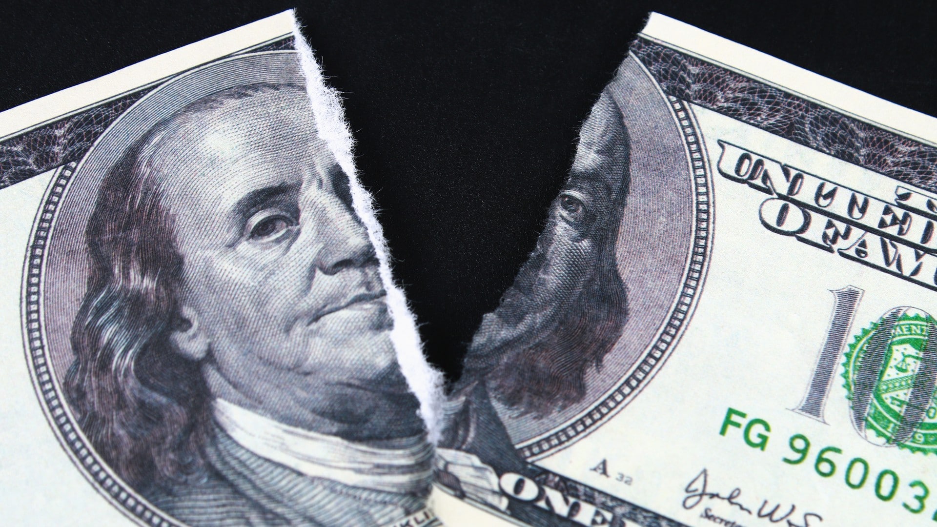 Nota de Dólar rasgada