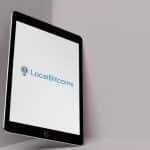 Tablet com imagem da plataforma LocalBitcoins