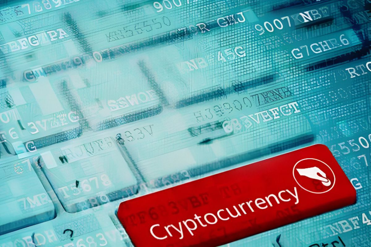 Foto de botão em teclado com texto de Criptomoedas