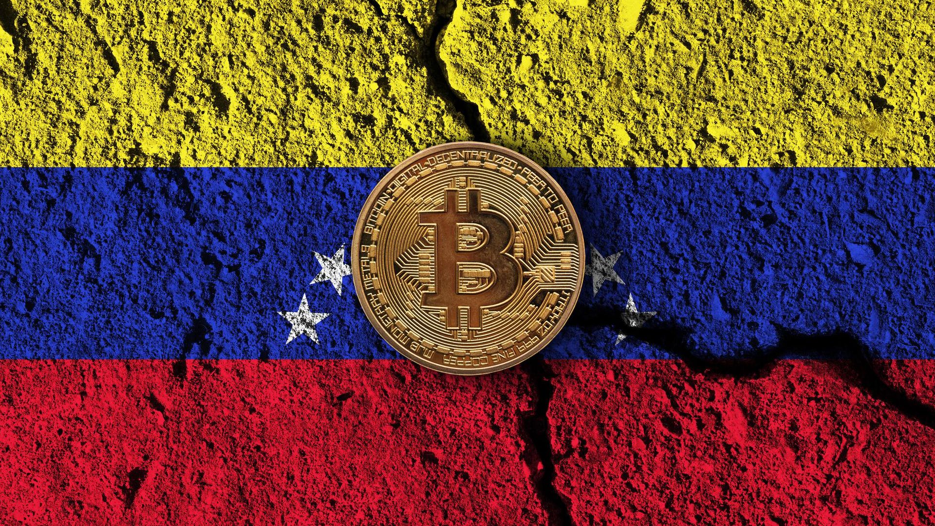 Bitcoin sobre bandeira da Venezuela pintada em muro quebrado