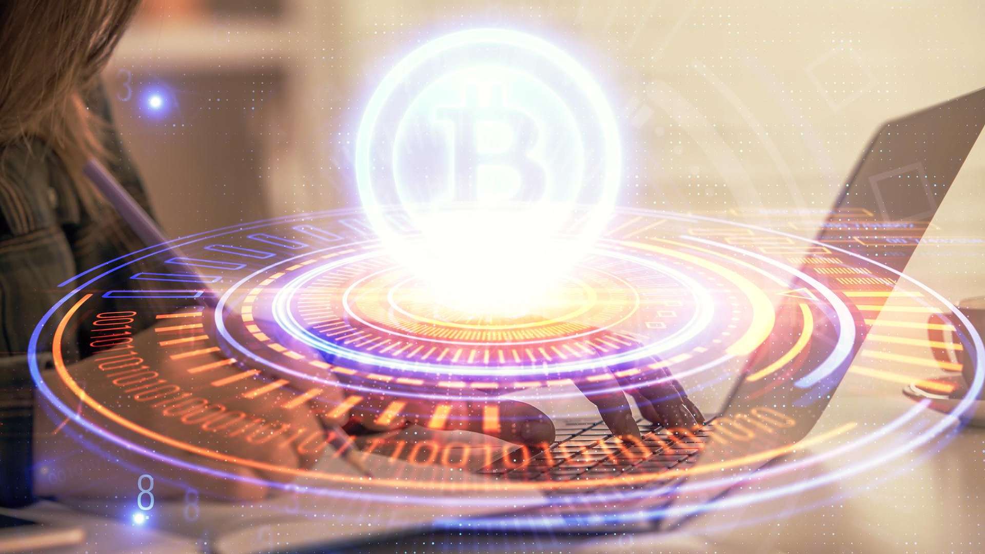 Bitcoin em destaque próximo de computador quantico
