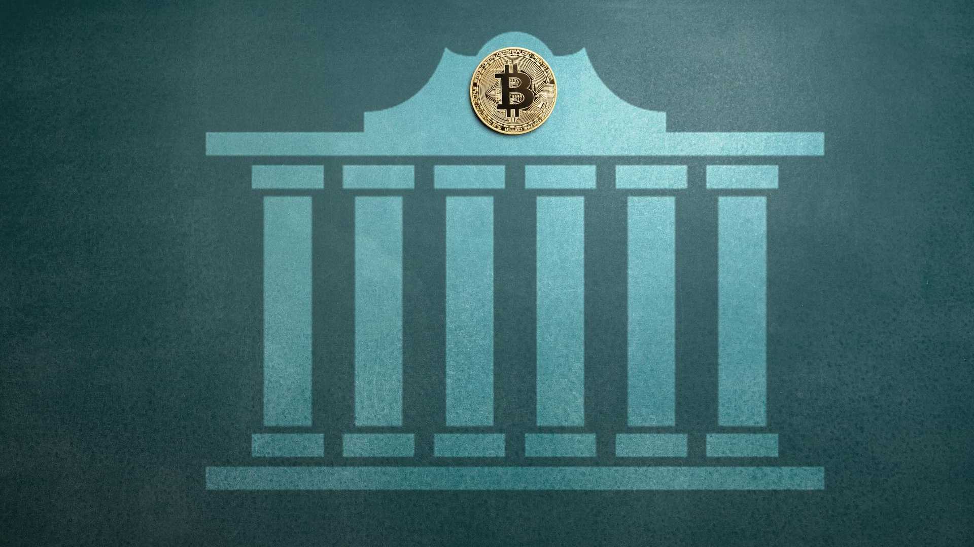 Símbolo de bancos e bitcoin em destaque