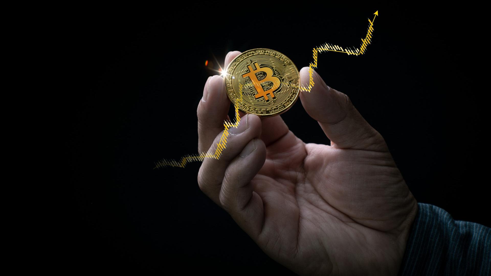 Bitcoin na mão com gráfico para alta Binance Research vê sinais de reversão no Bitcoin, mas alerta para pressão dos juros americanos